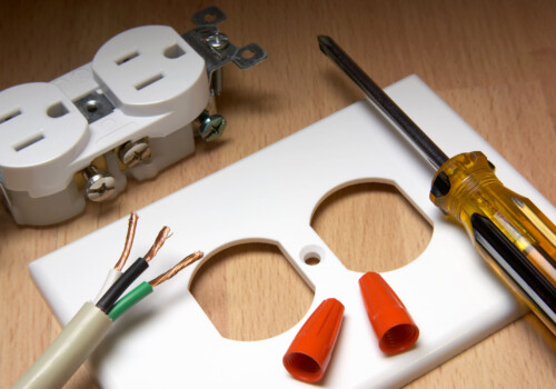 American electrical outlet and cover plate, with screwdriver and wire nuts